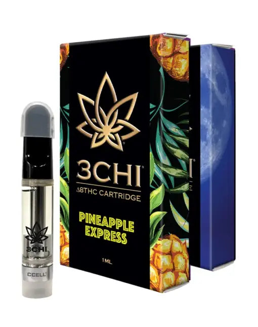 Image of a 3Chi Delta 8 Vape Cartridges | 1g in Pineapple Express flavor. The cartridge sits beside its black packaging adorned with pineapples and leaves, also featuring a logo with a stylized leaf.