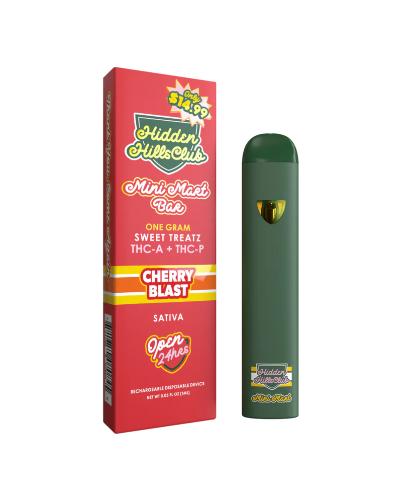A green Hidden Hills Mini Mart Sweet Treatz Disposable | 1g vape pen stands next to its red Hidden Hills packaging at Hidden Hills Mini Mart, highlighting THC, Sativa, price, and product details.