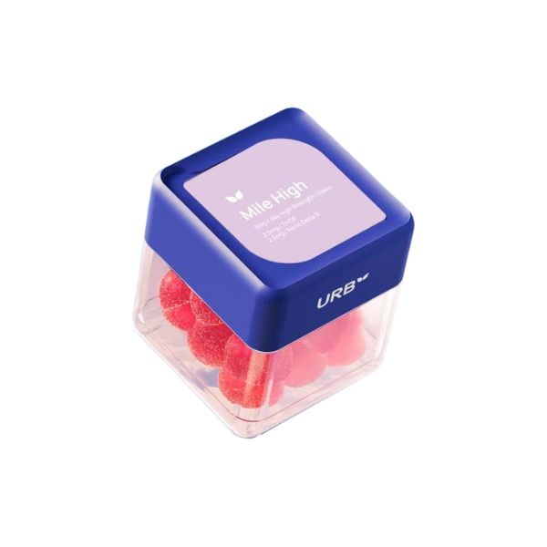 A clear plastic container with a blue lid labeled "Urb Mile High Skybites Gummies," containing pink round candies. The text on the lid includes "URB" along with details about the contents, which feature Nano Delta-9 THC for a unique experience.