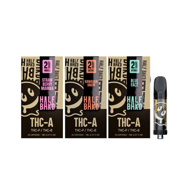 Three Half Bak'd THC-A Cartridges | 2g labeled "Strawberry Mamba," "Hawaiian Snow," and "Blue Face" from the brand Half Bak'd are displayed next to a single vape cartridge, ready for use with 510 vape batteries.