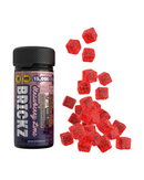 A bottle of Hidden Hills Heady Blend Brickz Gummies | 15000mg with red hexagon-shaped gummies scattered next to it. The label highlights 30 servings, 500mg CBD, and a total of 15,000mg hemp extract enriched with live resin for an elevated experience.