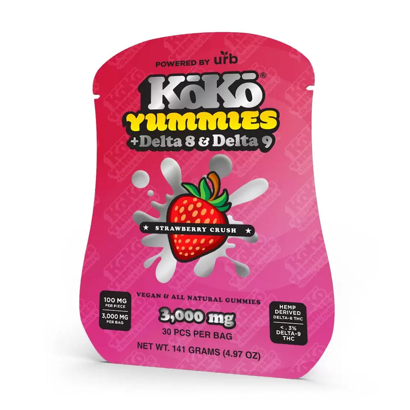 The packaging of Urb's Koko Yummies Delta 8/Delta 9 gummies in pink, labeled "Strawberry Crush," prominently highlights both Delta 8 THC and Delta 9 THC with clear dosage details. These vegan and natural treats offer a delightful experience for those looking for fruity Delta 9 Gummies.