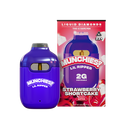 A purple disposable vape pen labeled "Delta Munchies: Munchies Lil Ripper THCA Disposable Vape | 2g" is placed next to its box, featuring a strawberry shortcake design and a 21+ age warning.