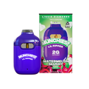 A purple vape pen labeled "Munchies Lil Ripper" sits beside packaging adorned with images of watermelon slices, featuring the text "Watermelon Slushy." The packaging indicates that it's a 2g disposable THCA Liquid Diamond Vape Pen from Delta Munchies, boasting lab-tested quality.
