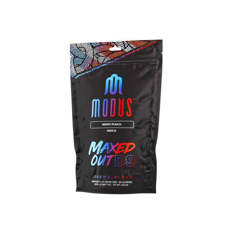 A black plastic bag labeled "Modus Maxed Out D9 Gummies, Berry Punch, Indica, 1000 MG Blend" with colorful designs and text accents promises a vibrant cannabis experience with hemp-derived Delta 9 THC from Modus.