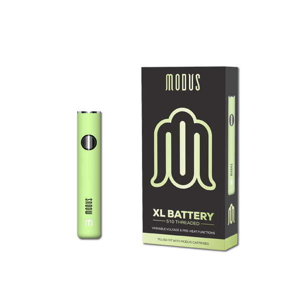 A lime green vape pen stands next to its matching box, labeled "Modus XL Vape Battery" with features listed including variable voltage, pre-heat functions, and 510-thread compatibility.