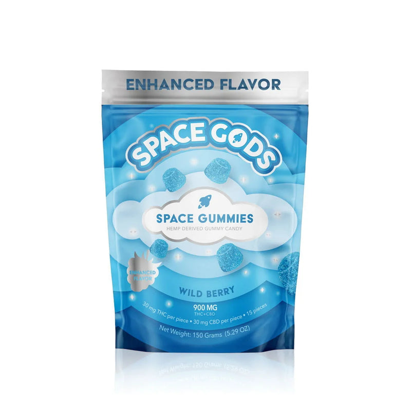 A blue and white package labeled "Space Gods Mega Dose Gummies | 900mg" with the flavor "Wild Berry" and 900 mg potency. The package also mentions "Enhanced Flavor," highlighting its nature as Hemp Derived Mega Dose Gummies.