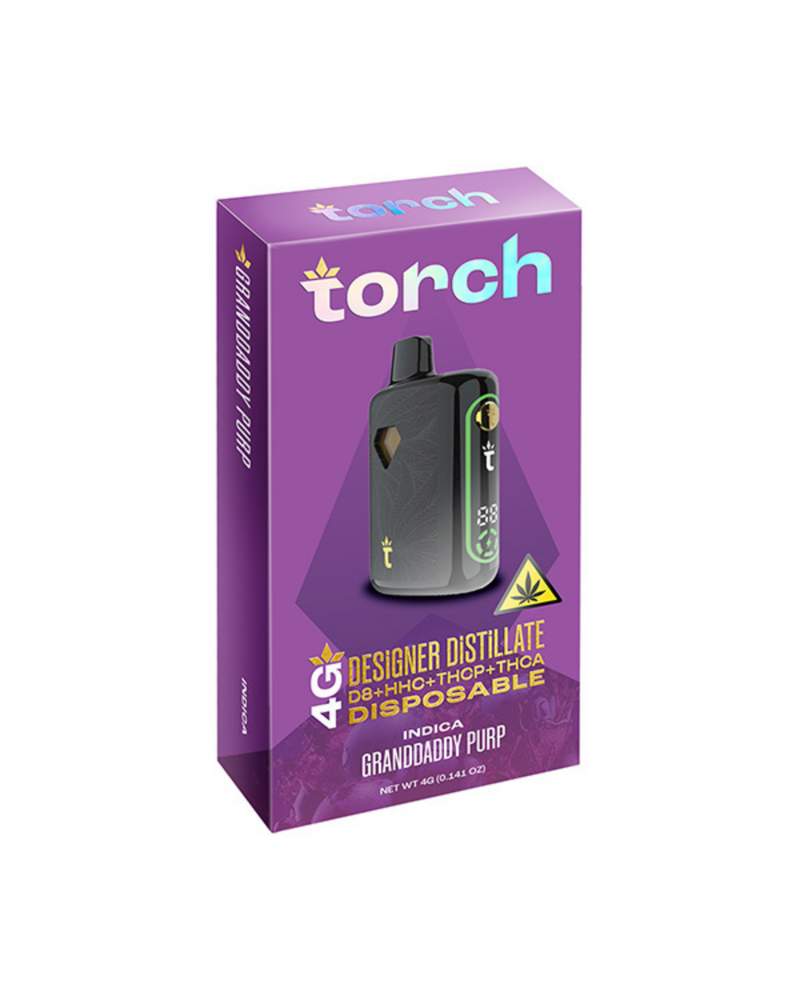 The Torch Designer Distillate Disposable (4g) comes in purple packaging labeled with "Granddaddy Purp," and "Indica" terpene-rich profiles. It features a sophisticated black device adorned with the Torch logo and a leaf icon.