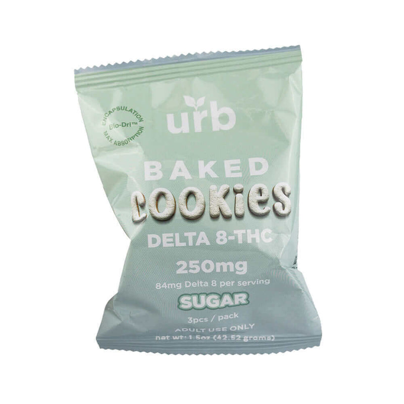 A sealed green bag labeled "Urb Delta 8 Baked Cookies 250mg" with details "84mg Delta 8 per serving," "SUGAR," "3pcs/pack," and "net wt. 1.5 oz (42.52 grams)" showcases the delicious Urb Delta 8 Baked Cookies perfect for a sweet, potent treat.