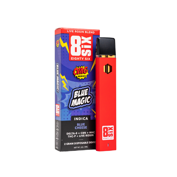 A red electronic vape pen labeled "Eighty Six Brand Live Rosin Disposables | 2g" rests next to a box featuring "Blue Magic" branding and an "Indica Blue Cheese" description, containing a Delta-8 THC-enhanced live rosin blend for an elevated experience.