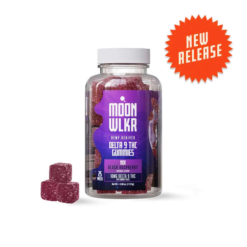 A clear bottle labeled "Moonwlkr Delta 9 Gummies" contains dark purple gummy cubes with a "New Release" badge in the top-right corner. The flavor, "Black Raspberry," is complemented by the potency of Delta 9 gummies, and the bottle holds 25 pieces.