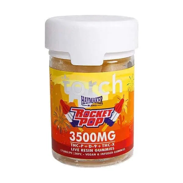 A jar of Torch Haymaker Blend Gummies from the brand Torch, containing 3500mg of total THC, featuring a powerful combination of THC-P, Delta-9 THC & THC-X live resin. The jar is clear with a white lid and has a vibrant label decorated with rockets and fireworks.